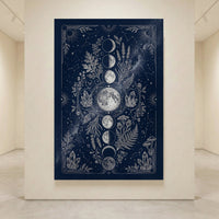 Intricate moon phases, stars, constellations, botanical plants, and crystals on a dark blue mystical canvas print.