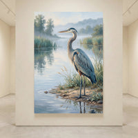 Great Blue Heron canvas print in oil painting style, standing by misty water with reeds, serene nature artwork.