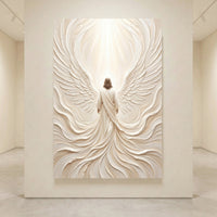 Spiritual canvas print of an angelic figure with large textured wings and glowing light, in cream and white tones.